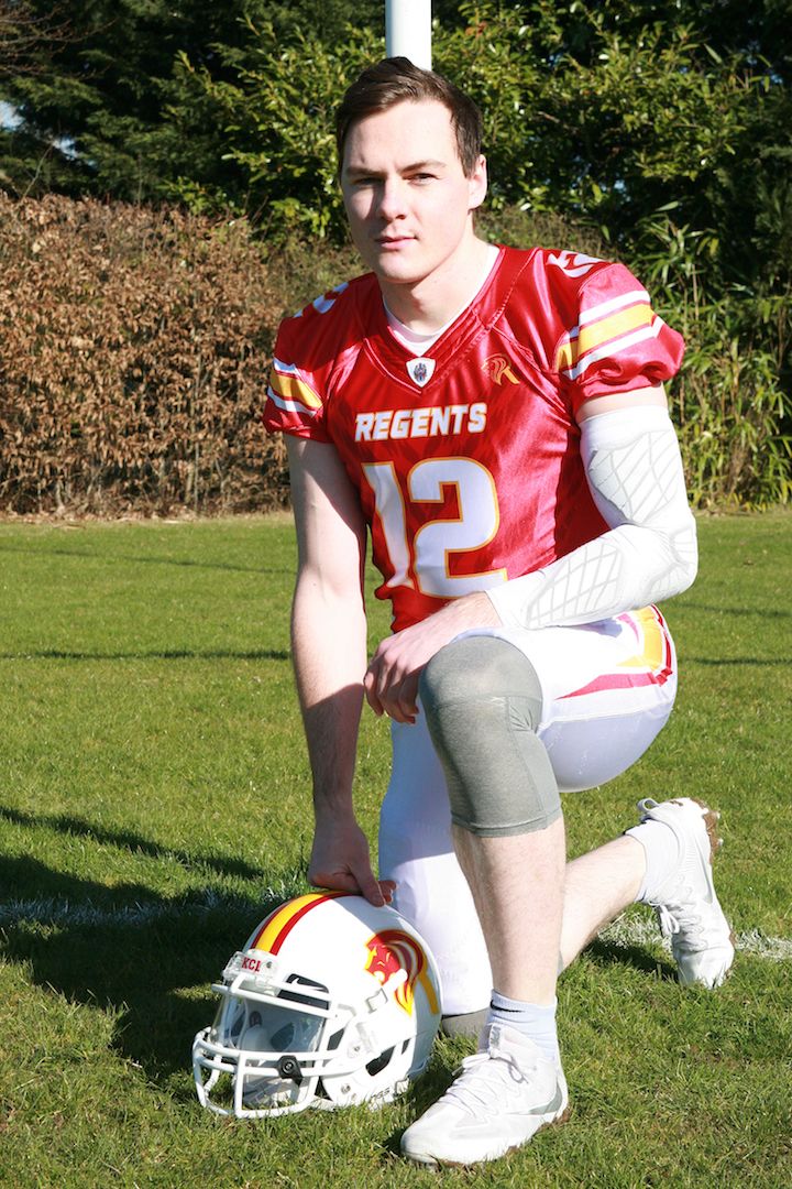 Image may contain: Soccer, Team Sport, Team, Sports, Sport, Helmet, Hardhat, Football Helmet, Football, Crash Helmet, Clothing, American Football, Person, People, Human