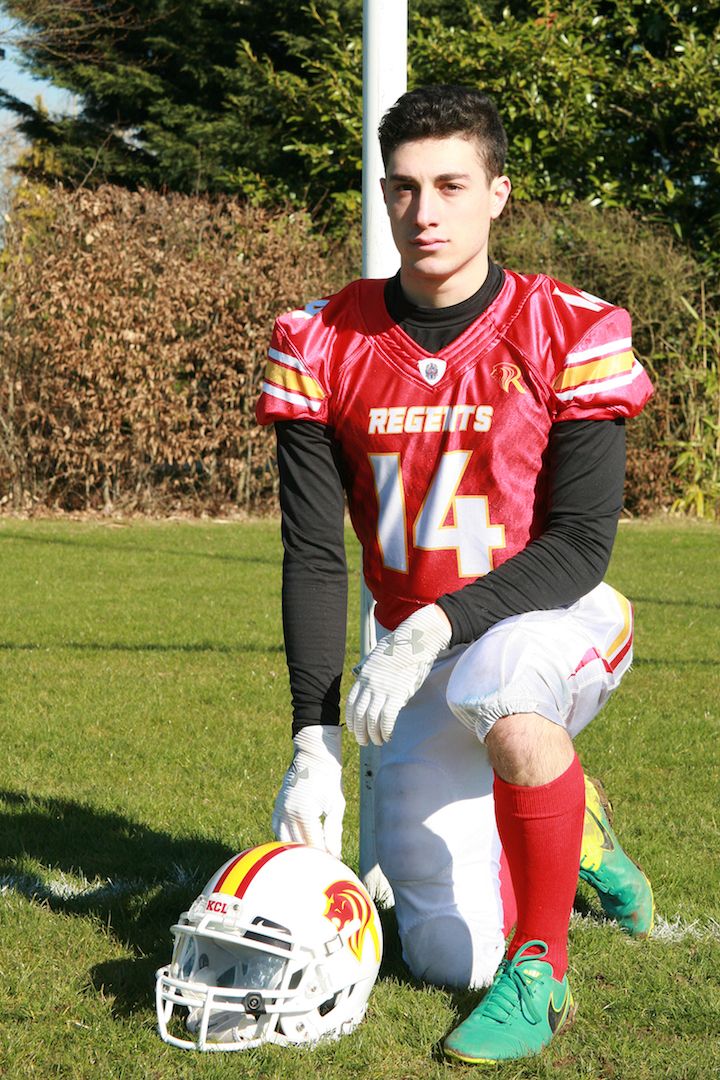 Image may contain: Team Sport, Team, Sports, Sport, Helmet, Hardhat, Football Helmet, Football, Crash Helmet, Clothing, American Football, Sphere, Ball, Person, People, Human