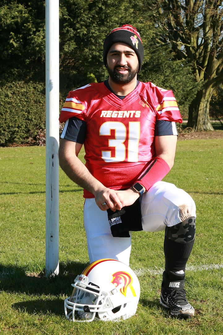 Image may contain: Yew, Tree, Plant, Flora, Conifer, Soccer, Team Sport, Team, Sports, Sport, Helmet, Hardhat, Football Helmet, Football, Crash Helmet, Clothing, American Football, Person, People, Human