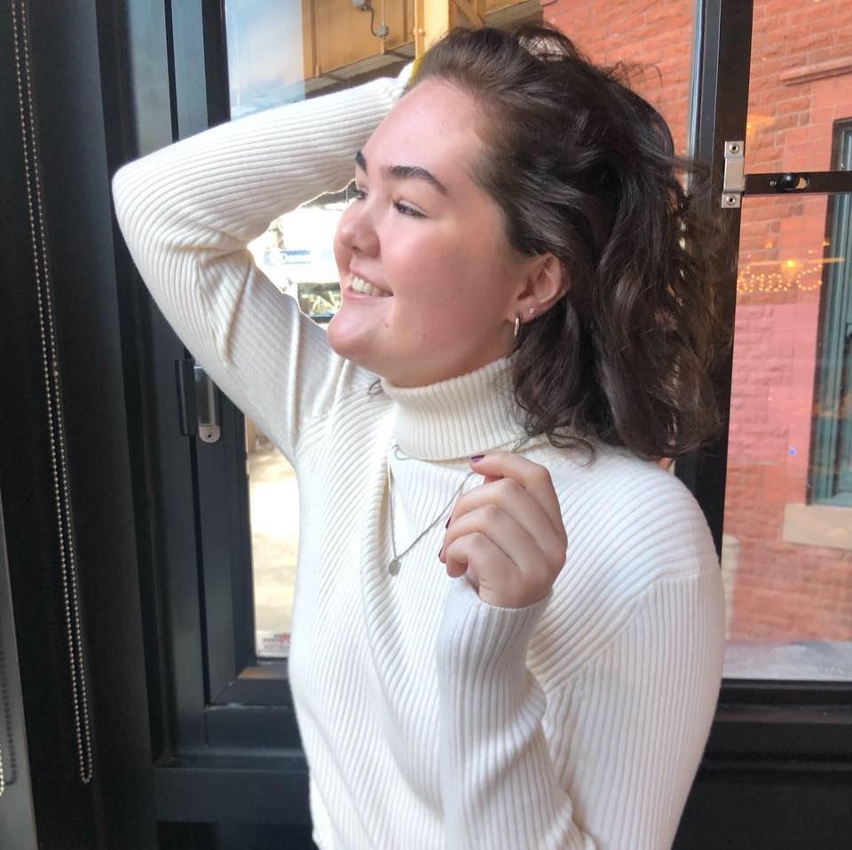 Image may contain: Female, Finger, Face, Long Sleeve, Home Decor, Door, Person, Human, Sleeve, Clothing, Apparel