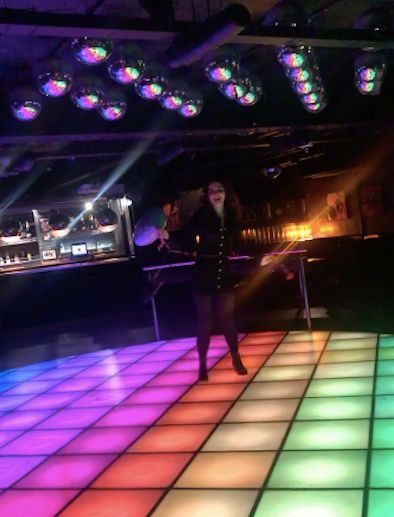 Image may contain: Disco, Night Club, Person, Human, Club, Lighting