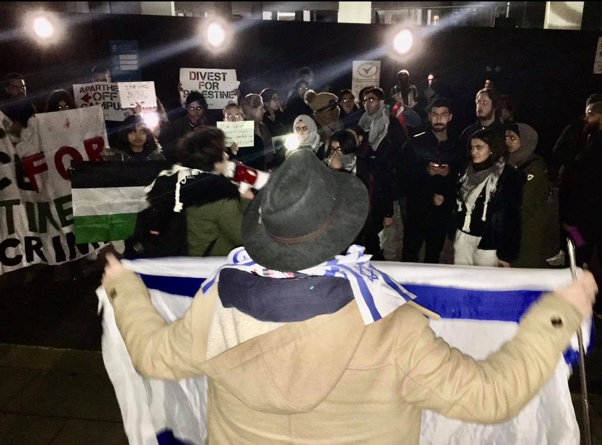 Image may contain: Lighting, Crowd, Hat, Person, Human, Clothing, Apparel