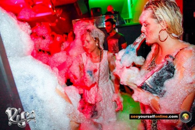 Stoically drinking a WKD covered in foam. The TAB admires your commitment to a good time.