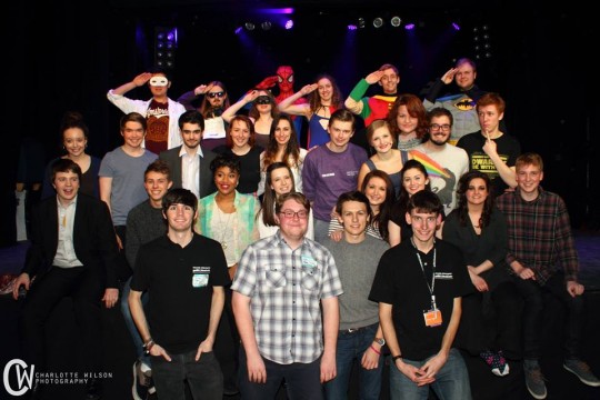 The cast, crew and band of superheroes