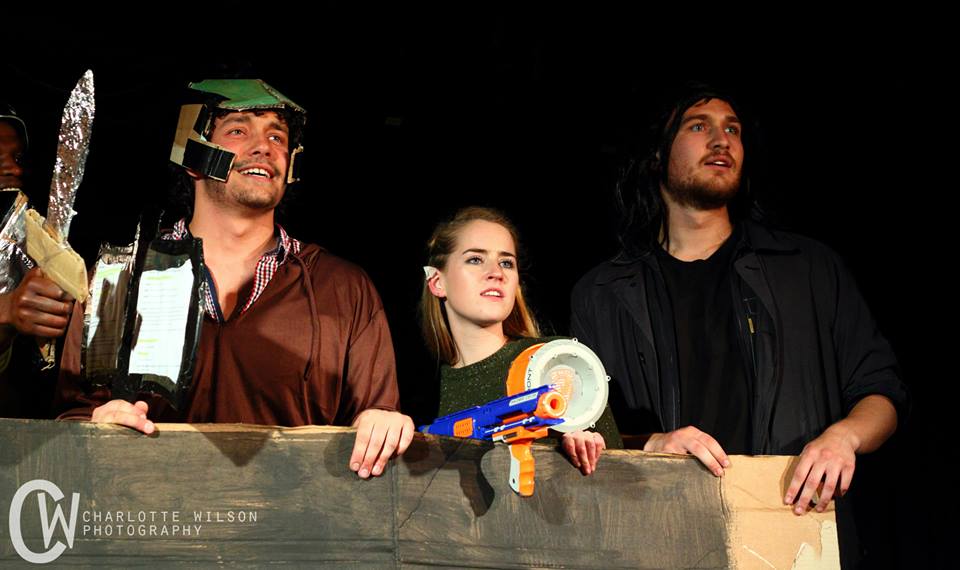 Gimli (Andrew Wilson), Legolas (Alice Hodgson) and Aragorn (Jake Williams) appear surprisingly optimistic before battle at Helm's Deep.
