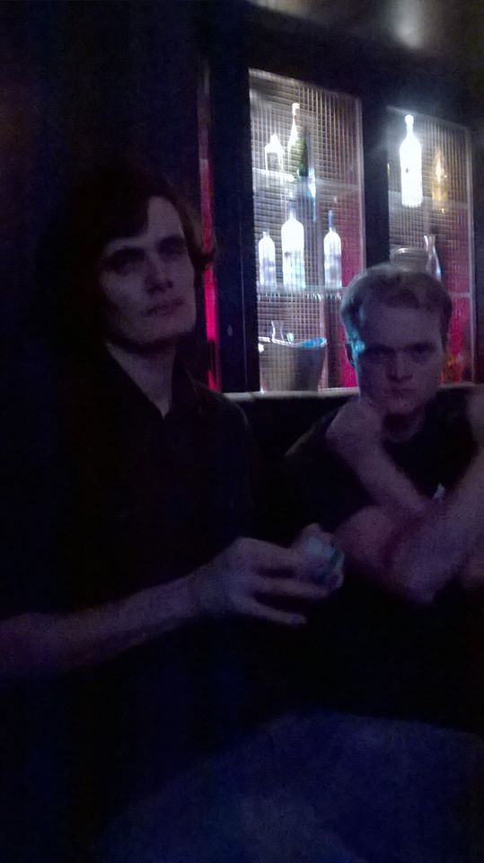 Pictured: (l) bored man, (r) middle class white guy attempting a gang sign.
