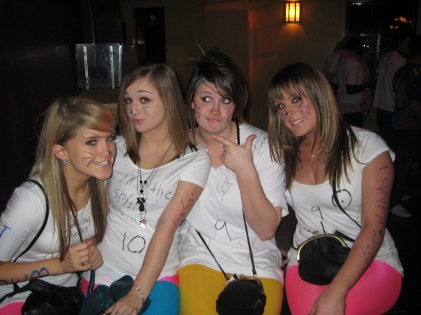 4 girls posing for camera