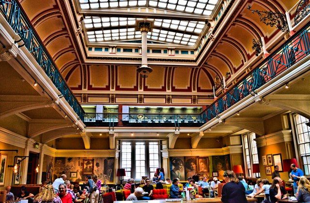 Image may contain: Crowd, Window, Skylight, Housing, Architecture
