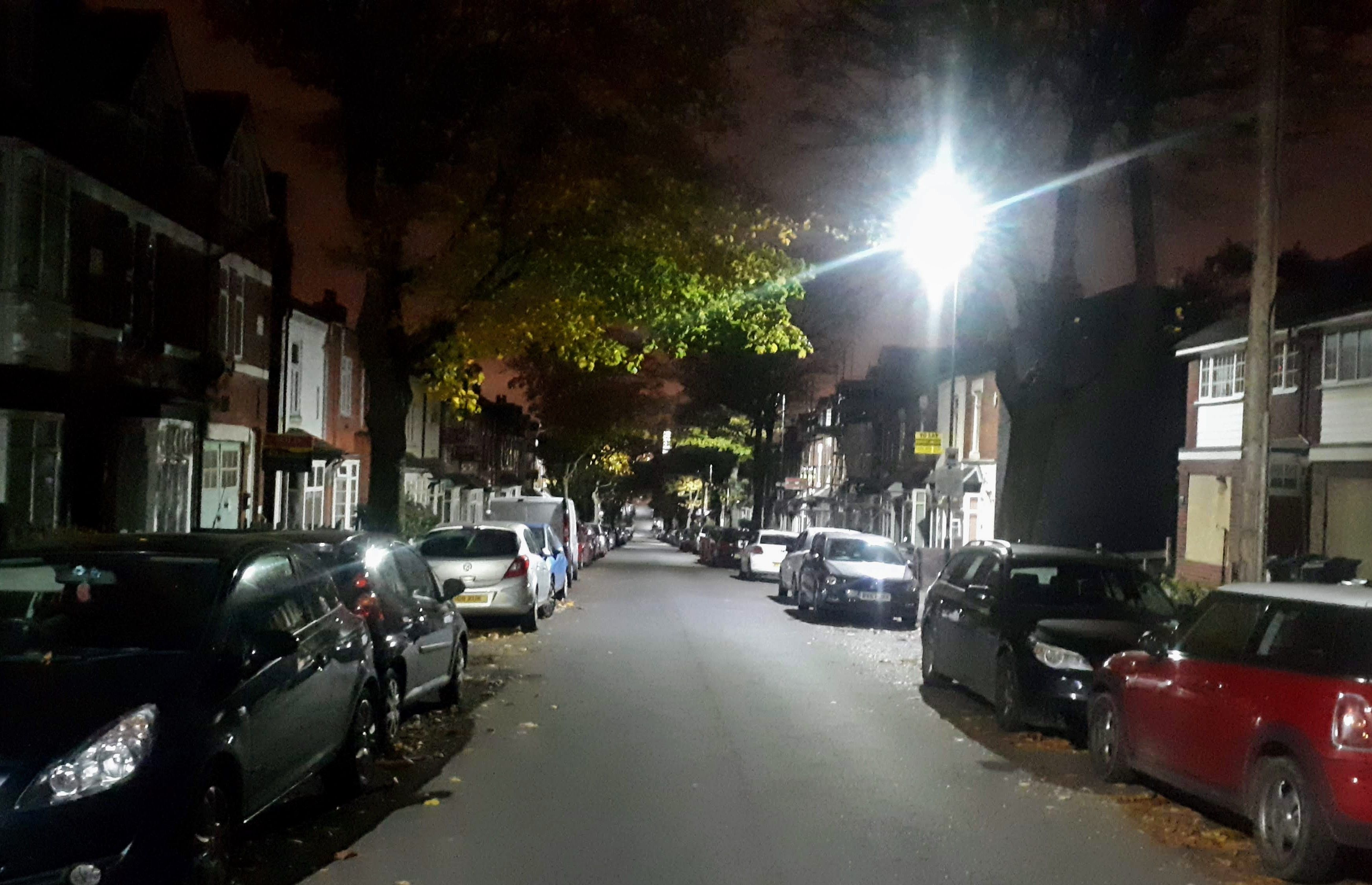Image may contain: Walkway, Sidewalk, Pavement, Path, Urban, Town, Street, Road, City, Building, Alleyway, Alley, Parking Lot, Parking, Vehicle, Transportation, Suv, Car, Automobile
