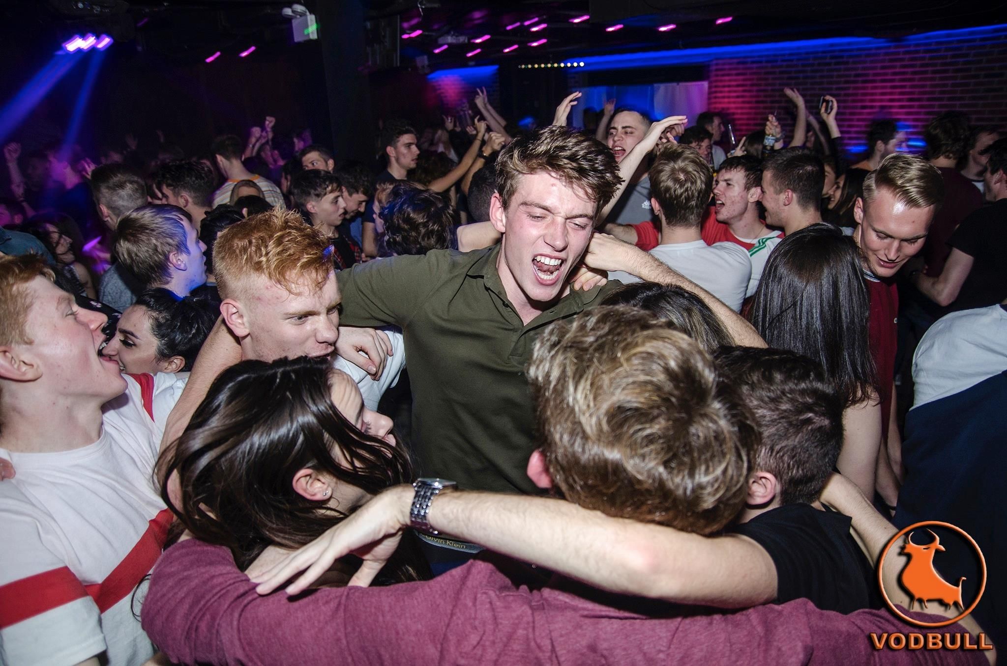 Image may contain: Audience, Crowd, Disco, Party, Night Life, Night Club, Club, Person, Human