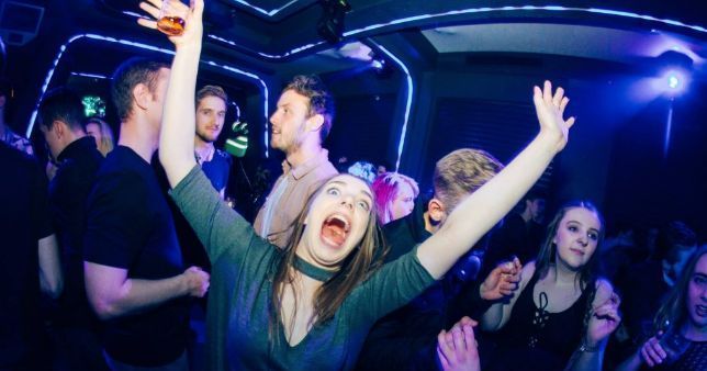 Image may contain: Disco, Party, Night Life, Night Club, Club, Human, Person