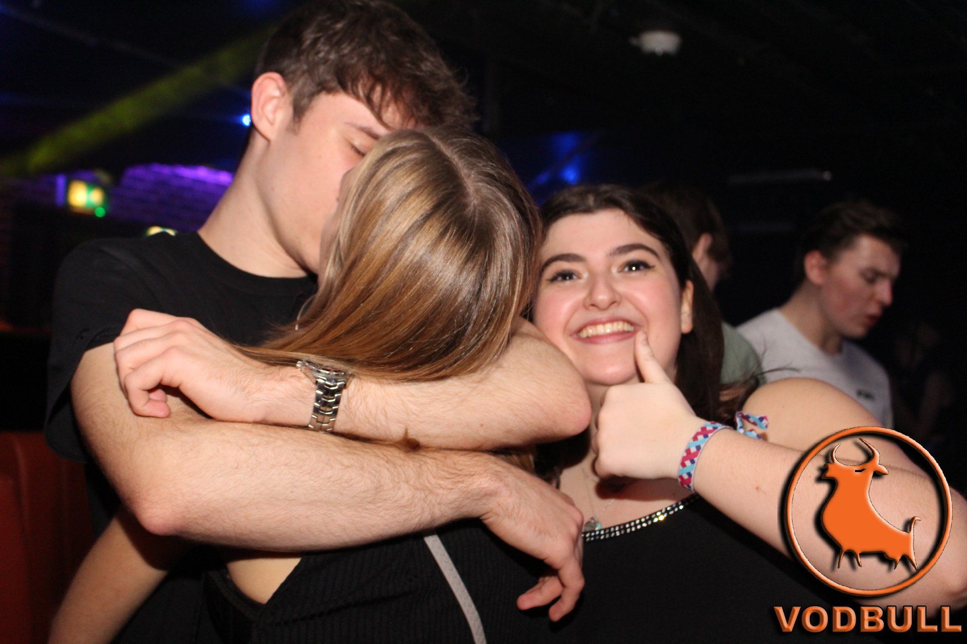 Image may contain: Finger, Wristwatch, Night Life, Night Club, Club, Human, Person