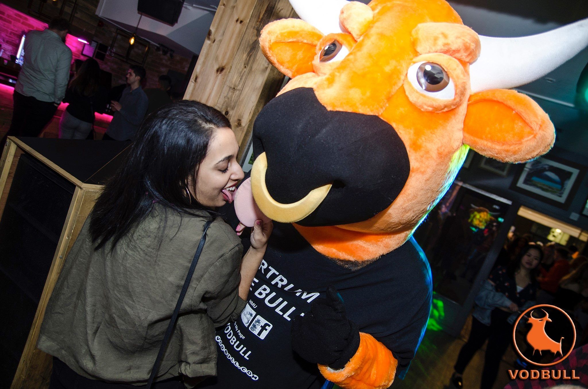 Image may contain: Night Life, Orange, Citrus Fruit, Fruit, Food, Plant, Mascot, Person, Human