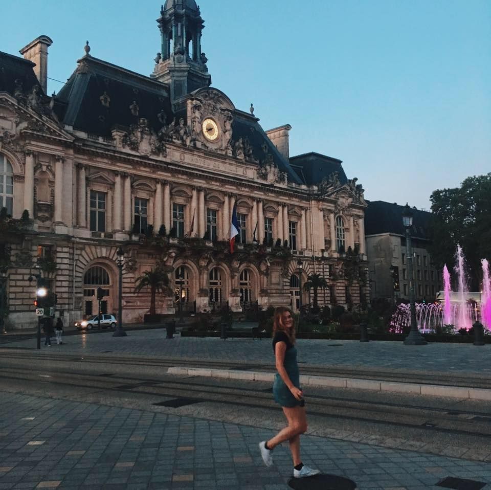 Image may contain: Town Square, Plaza, Road, Metropolis, Water, Architecture, Footwear, Shoe, Apparel, Clothing, Person, Human, Building, City, Town, Urban, Downtown