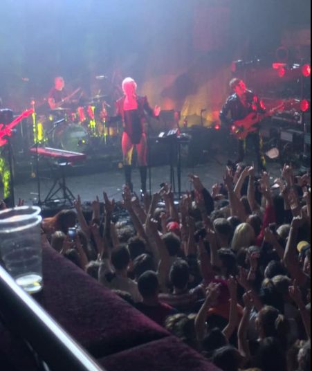 Image may contain: Club, Rock Concert, Leisure Activities, Musical Instrument, Guitar, Concert, Night Life, Crowd, Person, Human