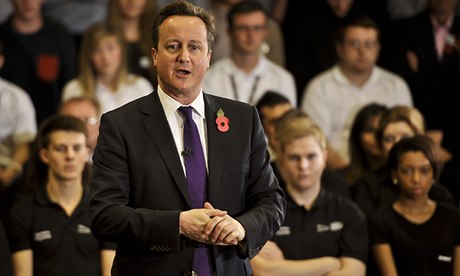 Cameron tours the Mini car plant in Oxford.