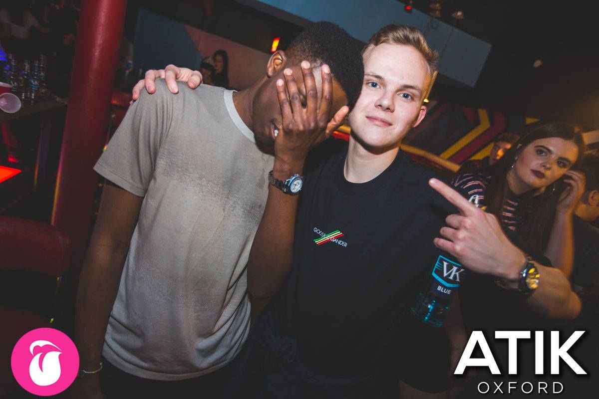 Image may contain: Cup, Night Life, Night Club, Club, Person, People, Human