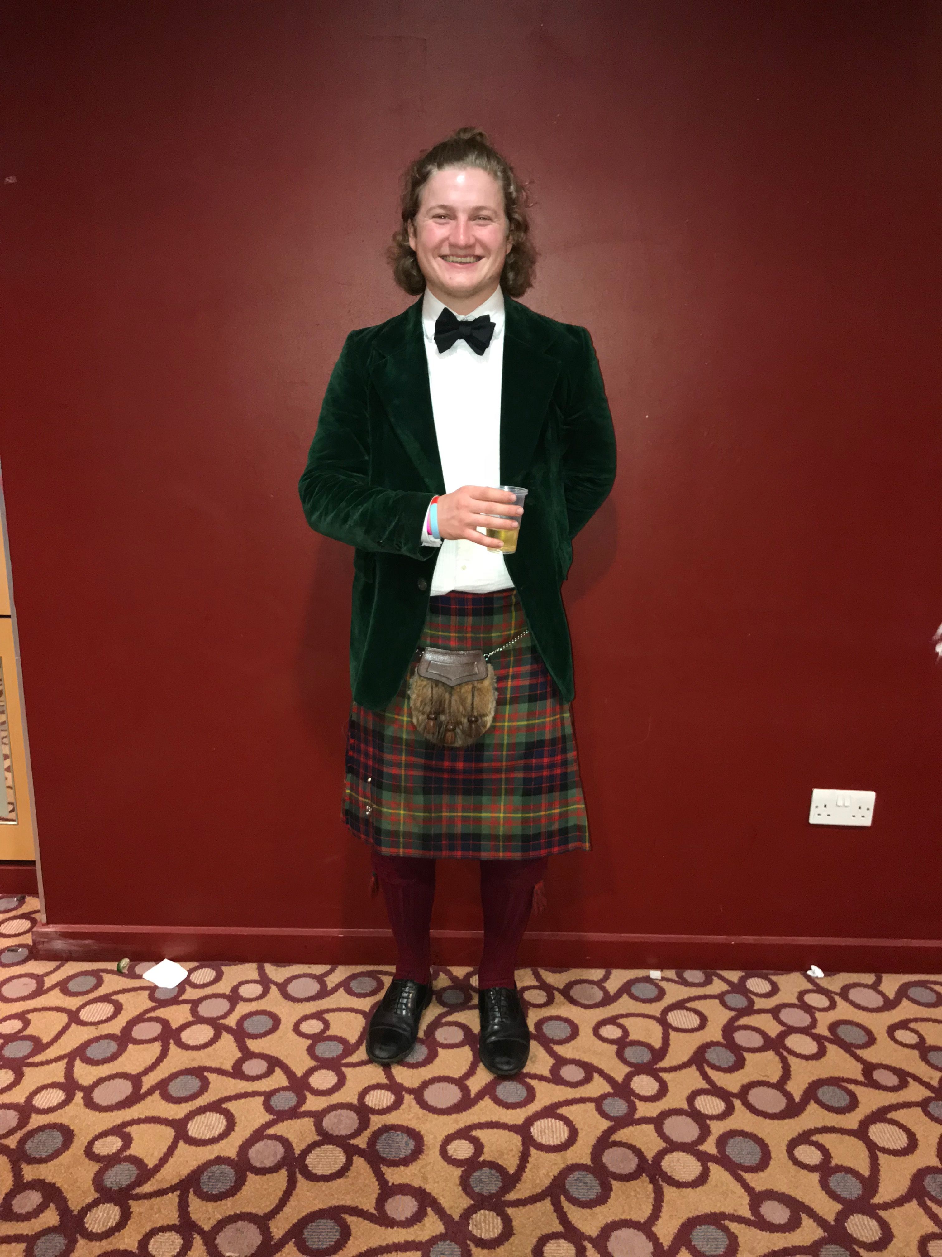 Image may contain: Tartan, Skirt, Plaid, Kilt, Clothing, Person, People, Human