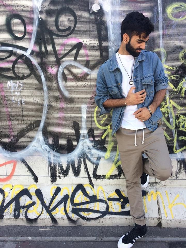 Image may contain: Hair, Afro Hairstyle, Graffiti, Person, People, Human