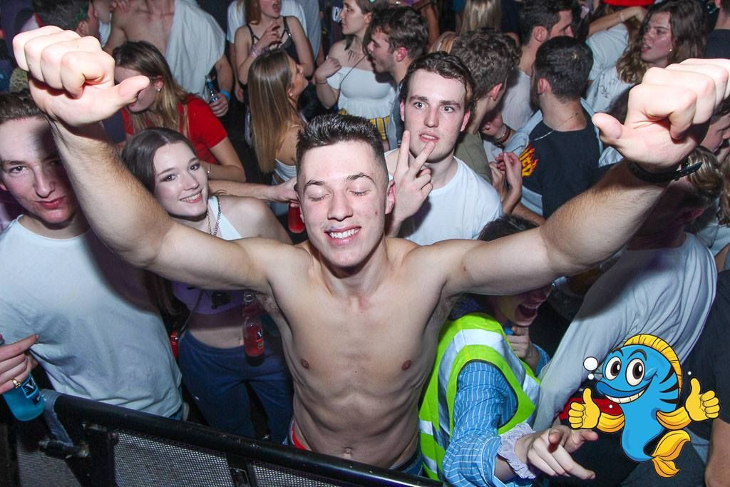 Image may contain: Club, Skin, Face, Audience, Crowd, Party, Human, Person