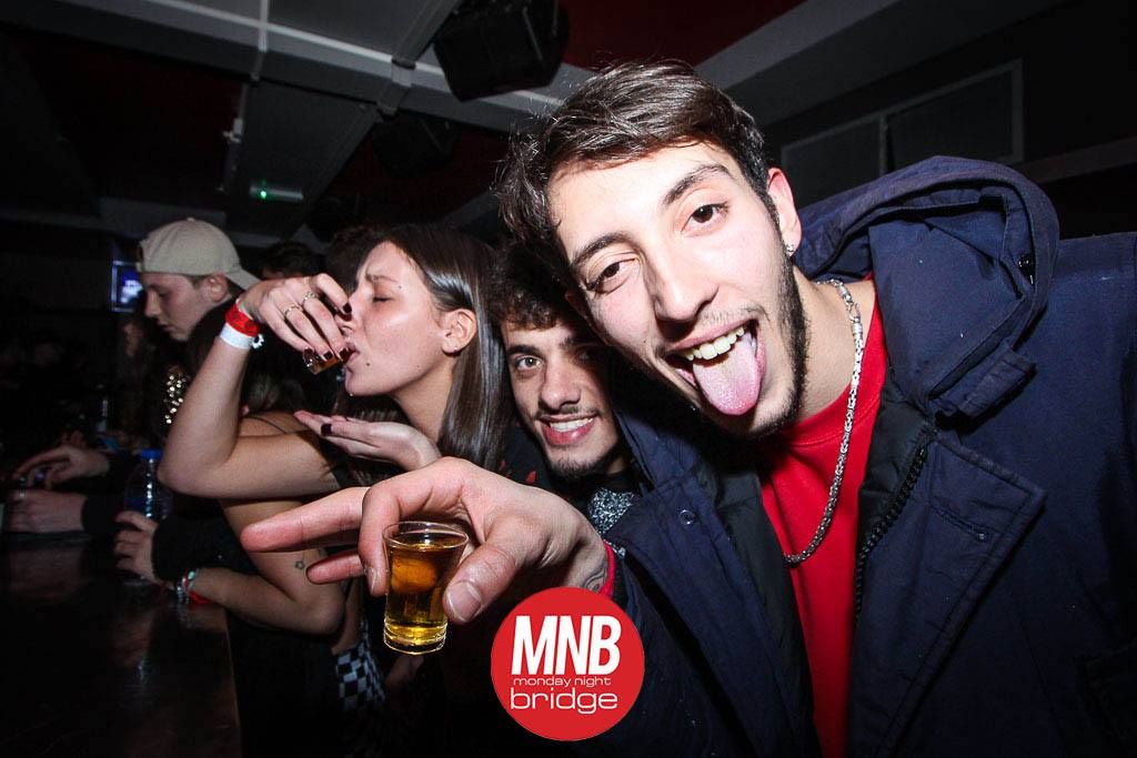 Image may contain: Glass, Night Club, Night Life, Club, Alcohol, Beer, Beverage, Drink, Party, Human, Person
