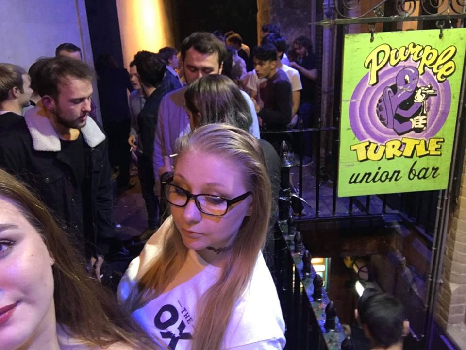 Image may contain: Hair, Party, Crowd, Bar Counter, Night Club, Pub, Club, Night Life, Glasses, Accessory, Accessories, Person, Human