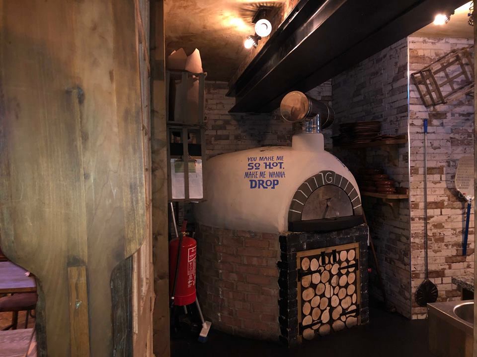 Image may contain: Housing, Pub, Bunker, Brick, Architecture, Urban, Street, City, Town, Road, Crypt, Building