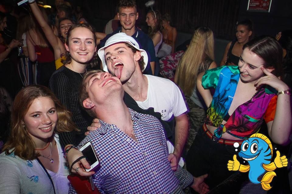 Image may contain: Interior Design, Indoors, Leisure Activities, Crowd, Audience, Night Club, Club, Night Life, Party, Human, Person