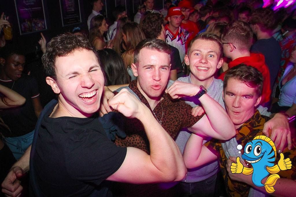 Image may contain: Leisure Activities, Face, Head, Night Club, Crowd, Audience, Night Life, Club, Human, Person, Party