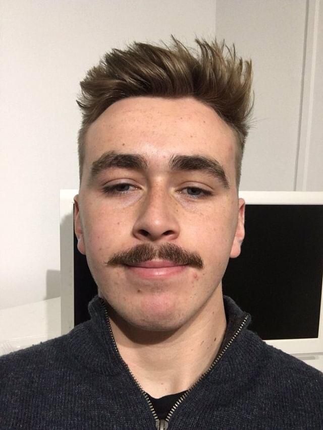 Image may contain: Man, Mustache, Hair, Photography, Photo, Portrait, Head, Human, Person, Face