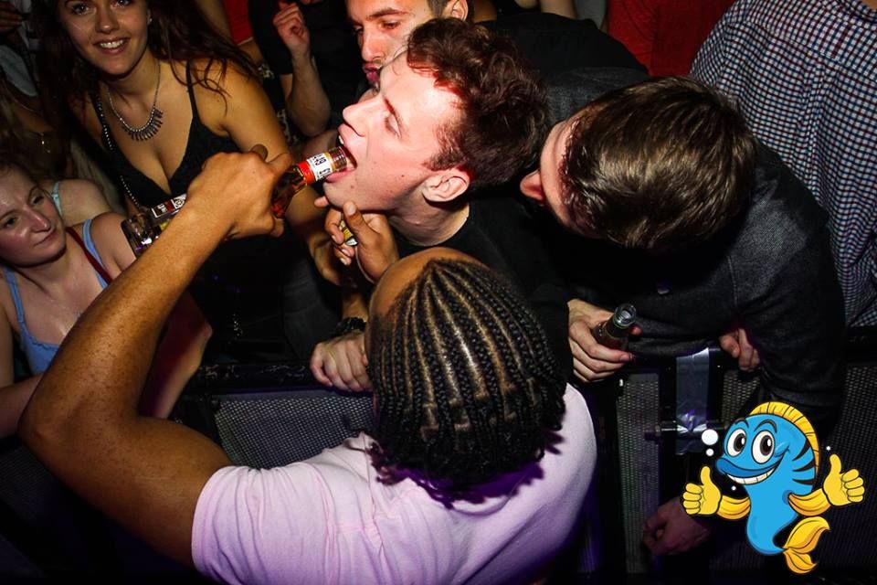 Image may contain: Pub, Bar Counter, Night Club, Night Life, Club, Human, Person, Party, Skin