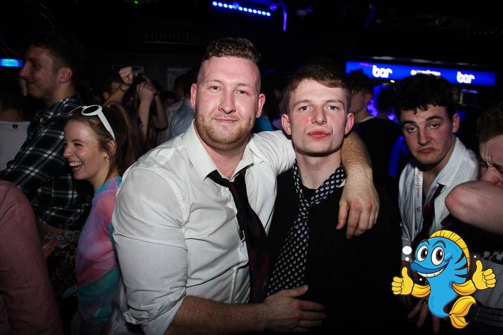Image may contain: Crowd, Sunglasses, Bar Counter, Party, Pub, Night Club, Tie, Accessories, Accessory, Night Life, Club, Person, Human