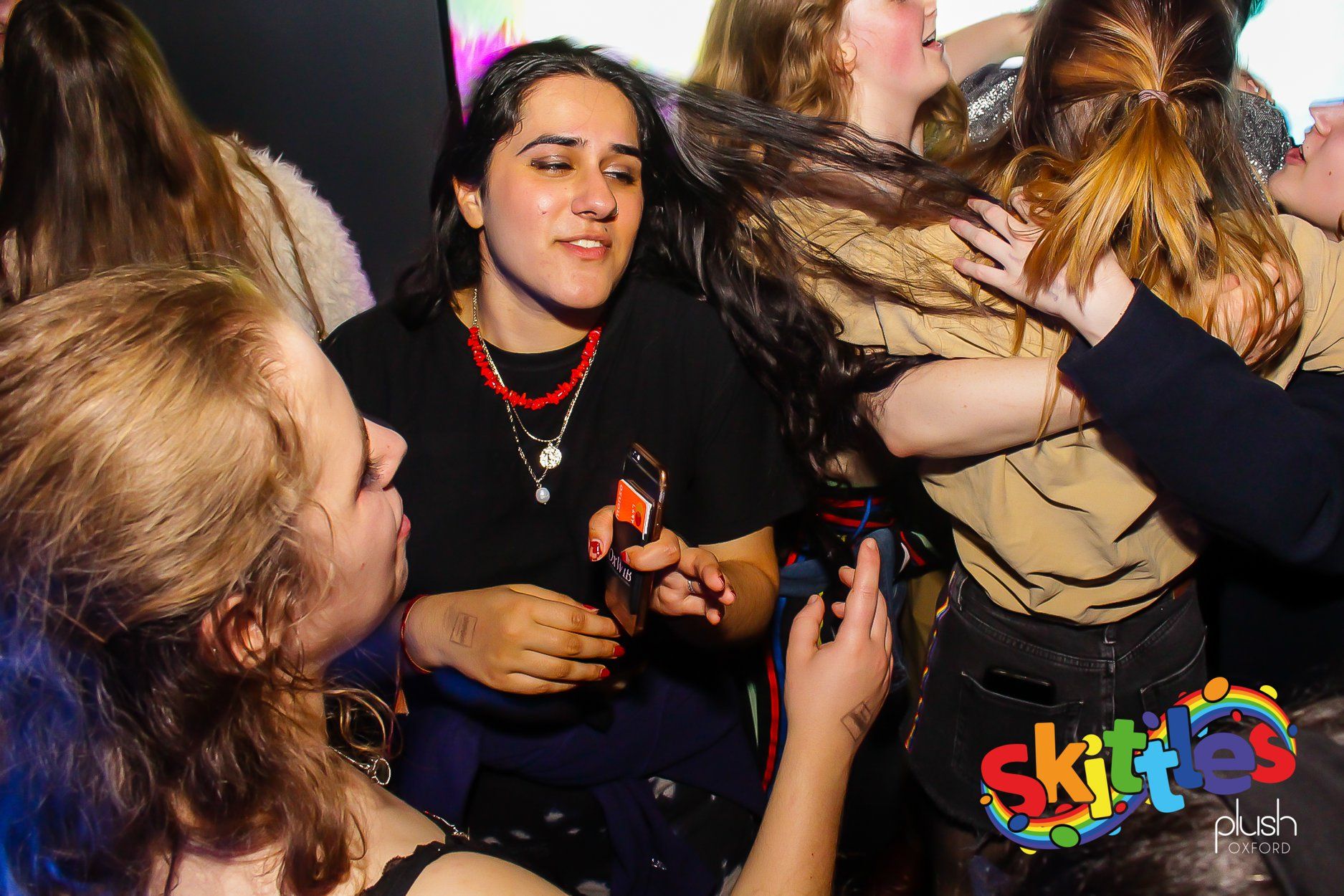 Image may contain: Leisure Activities, Skin, Party, Night Life, Night Club, Club, Human, Person
