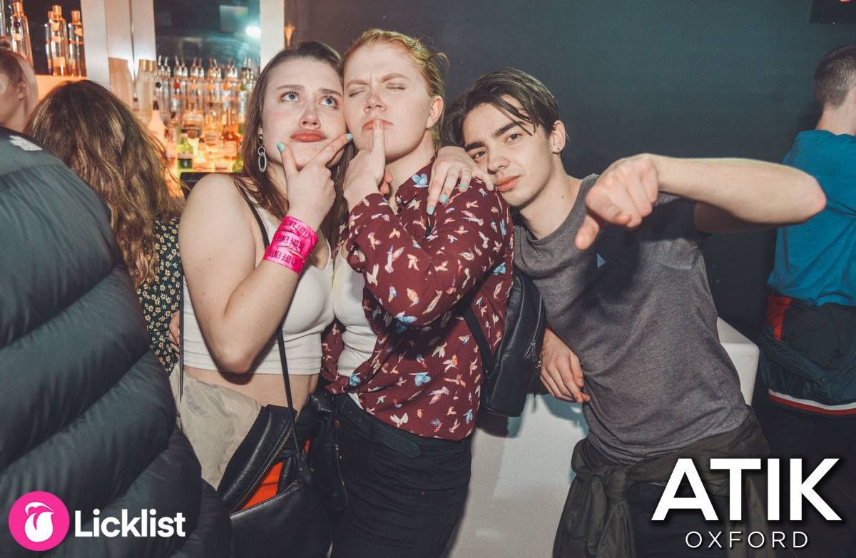 Image may contain: Apparel, Clothing, Pub, Bar Counter, Party, Night Club, Club, Human, Person