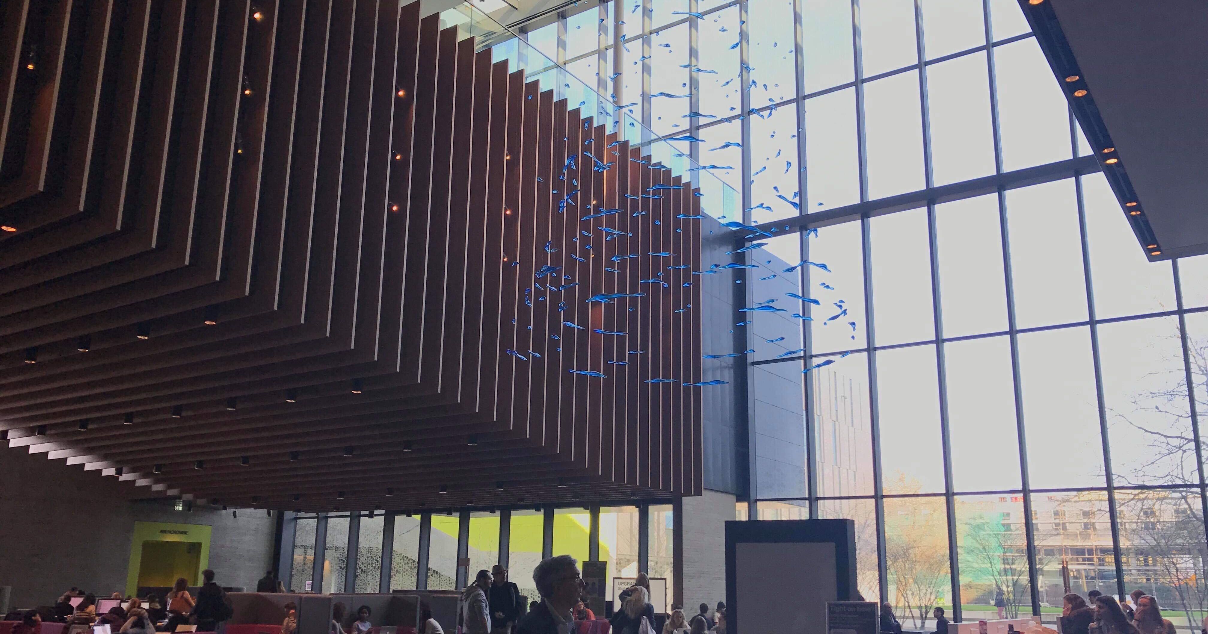 Image may contain: Convention Center, Crowd, Architecture, Building, Office Building, Person, Human