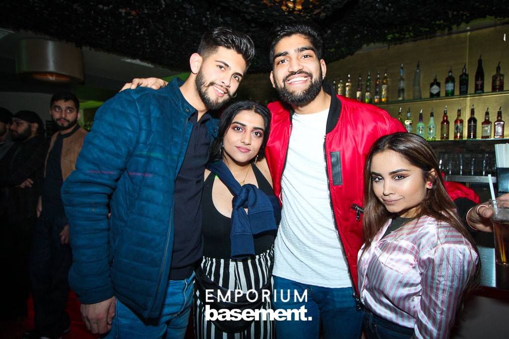Image may contain: Face, Pub, Bar Counter, People, Coat, Apparel, Jacket, Clothing, Dating, Party, Night Club, Club, Person, Human