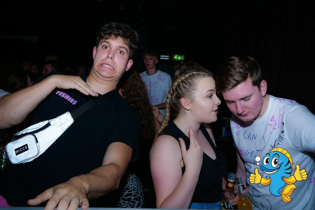 Image may contain: Leisure Activities, Night Club, Bar Counter, Pub, Party, Club, Night Life, Person, Human