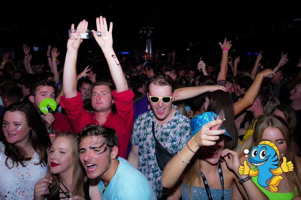 Image may contain: Night Club, Leisure Activities, Club, Audience, Crowd, Party, Night Life, Accessories, Accessory, Sunglasses, Human, Person