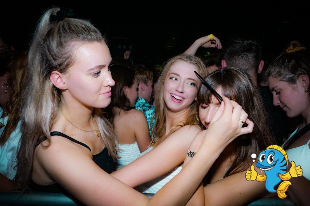 Image may contain: Night Club, Night Life, Club, Party, Person, Human