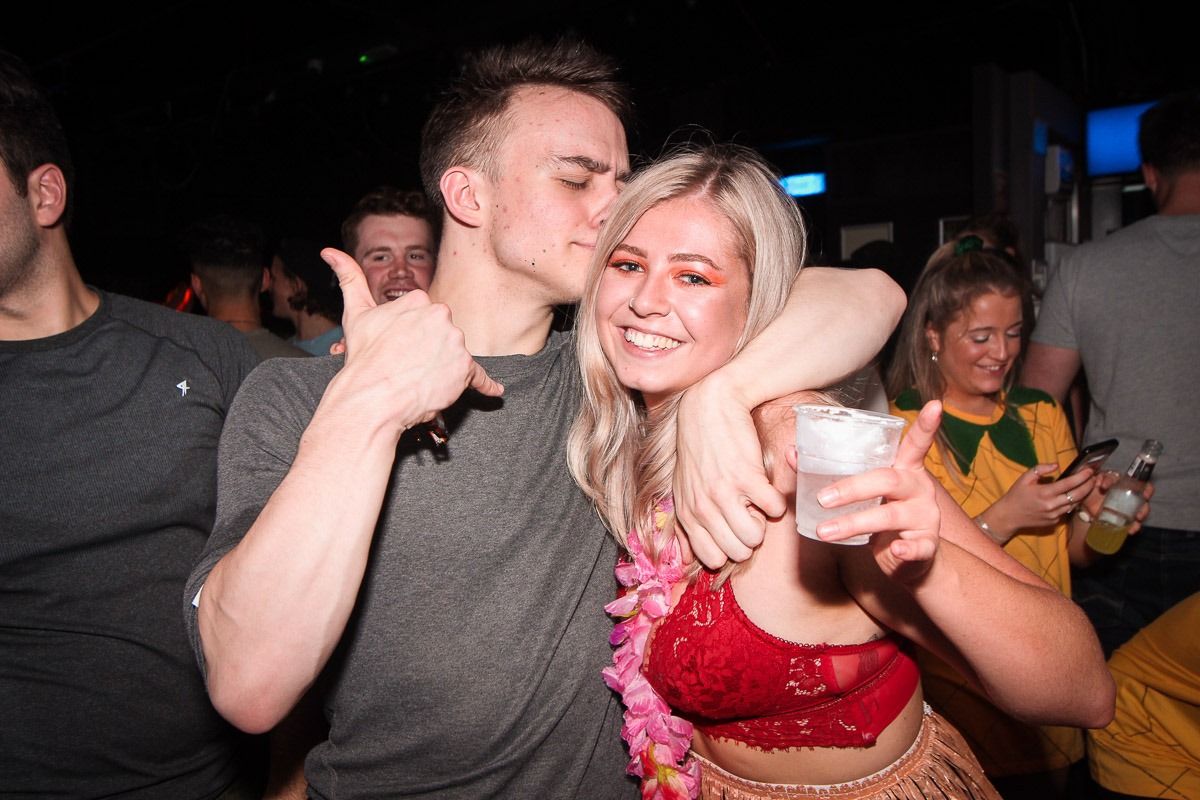 Image may contain: Clothing, Apparel, Party, Night Life, Night Club, Club, Person, Human
