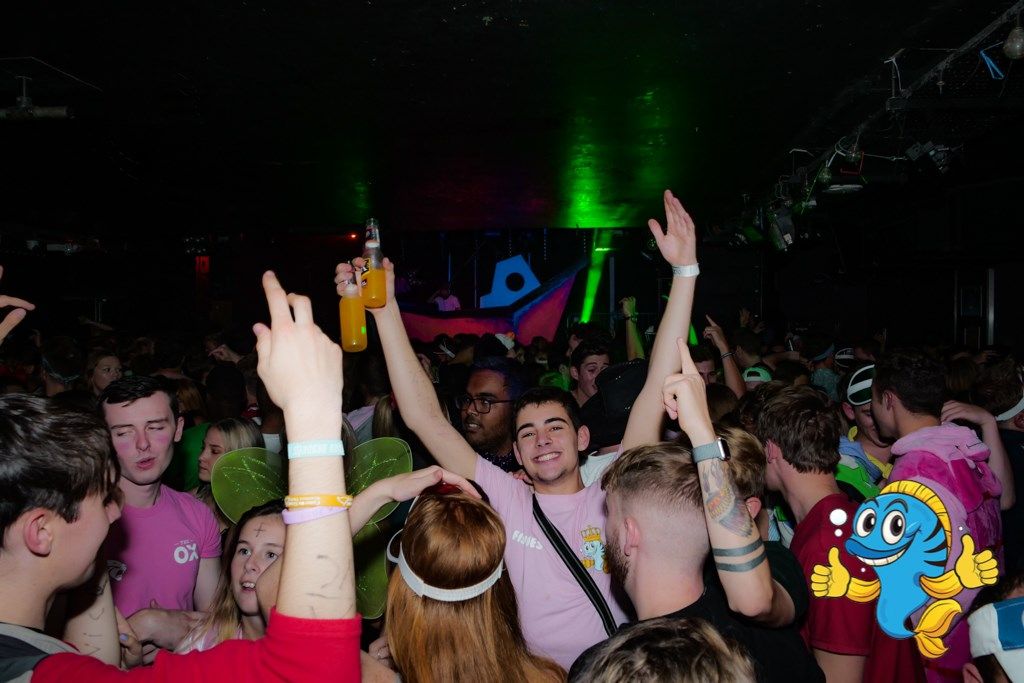 Image may contain: Crowd, Night Club, Club, Party, Human, Person, Night Life