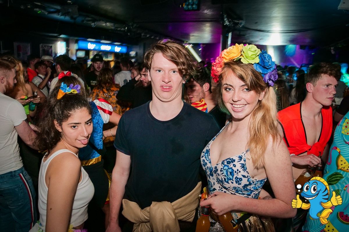 Image may contain: Leisure Activities, Pub, Bar Counter, Party, Night Club, Club, Night Life, Human, Person