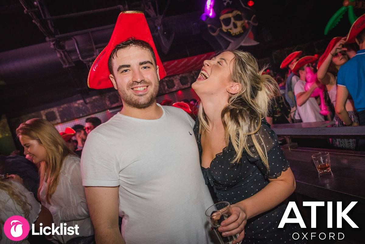 Image may contain: Party, Hat, Apparel, Clothing, Night Life, Night Club, Club, Human, Person