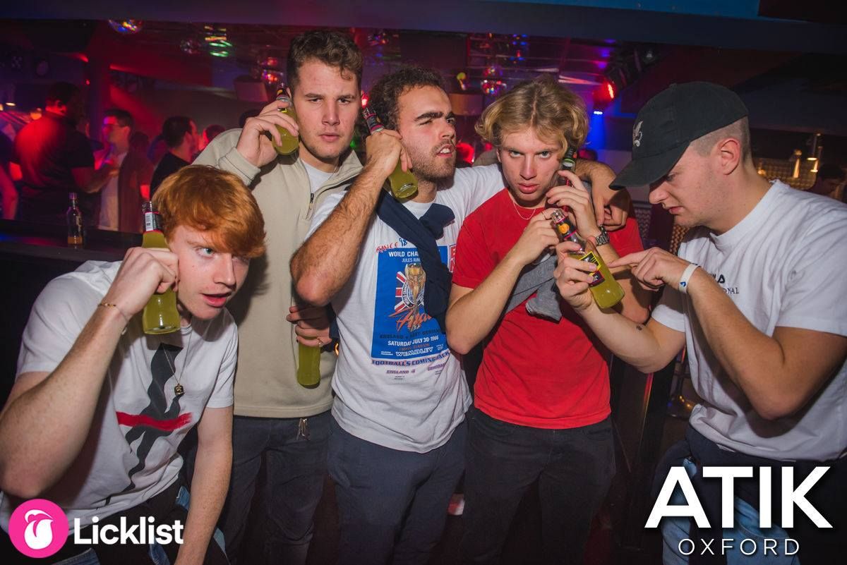 Image may contain: Apparel, Hat, Clothing, Night Club, Club, Party, Person, Human