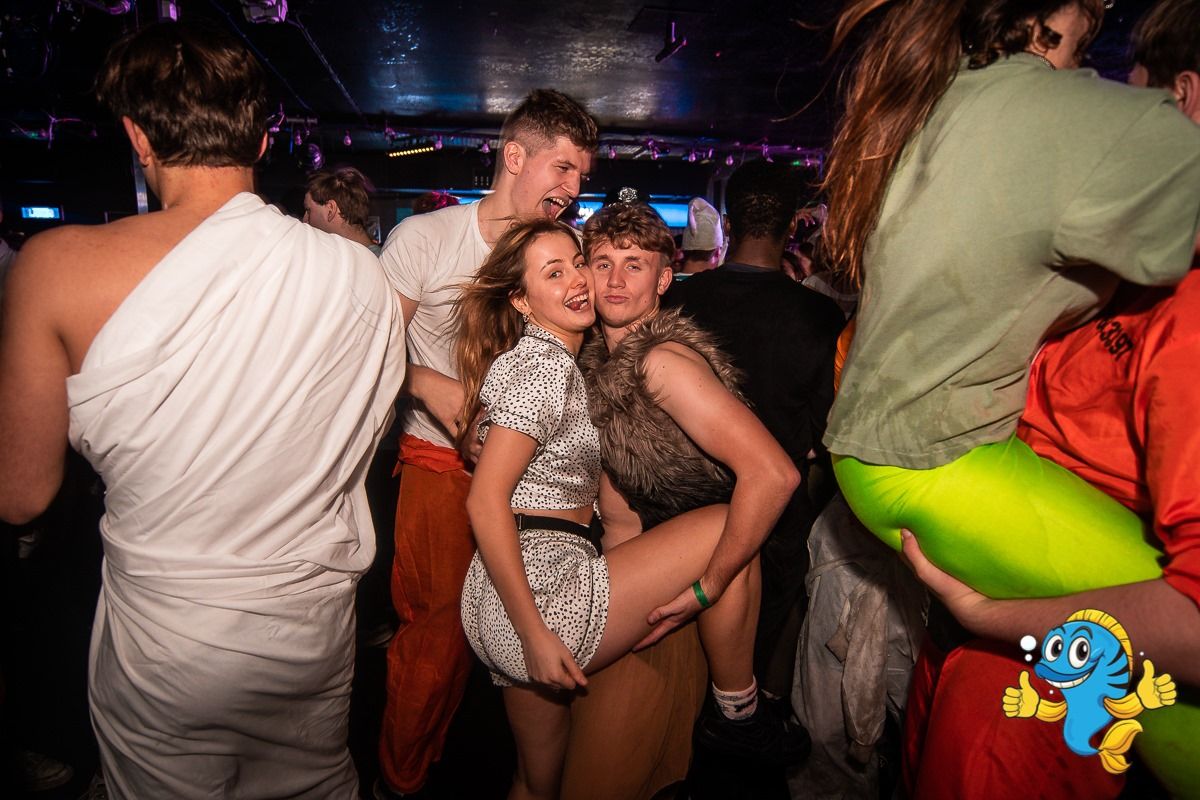 Image may contain: Bar Counter, Pub, Party, Night Club, Night Life, Club, Human, Person