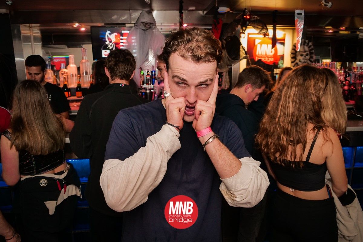 Image may contain: Club, Night Life, Bar Counter, Pub, Human, Person