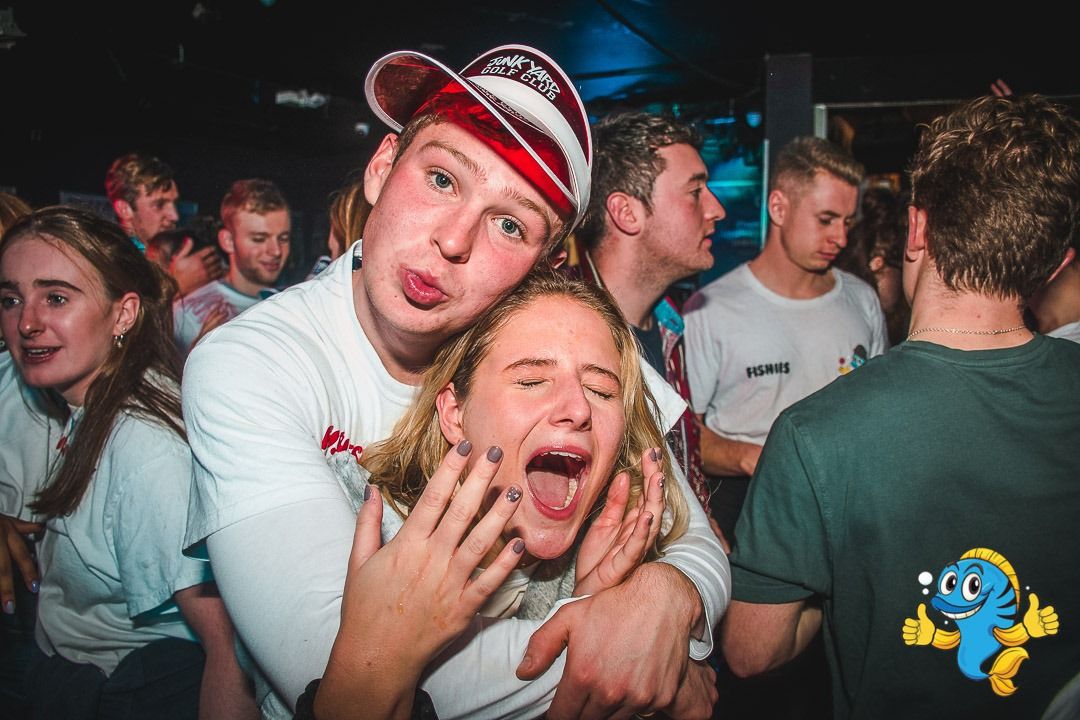 Image may contain: Night Life, Crowd, Leisure Activities, Night Club, Skin, Club, Party, Person, Human