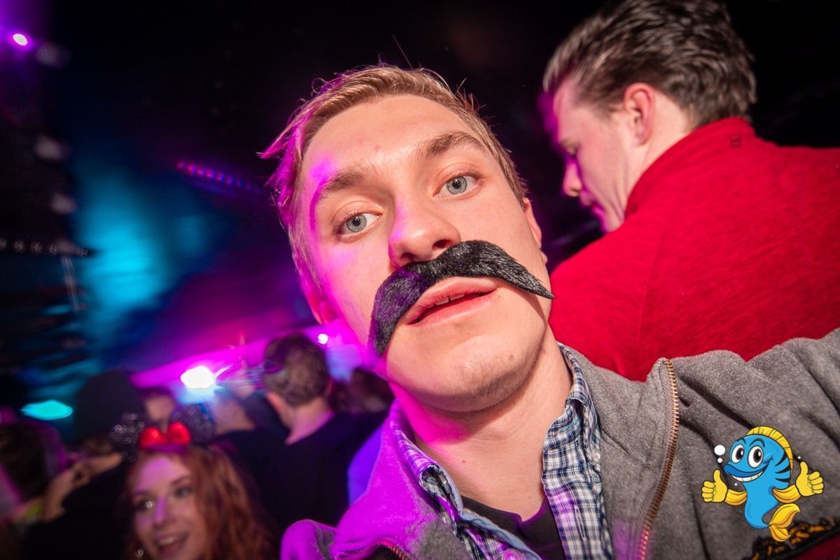 Image may contain: Party, Night Club, Face, Club, Night Life, Person, Human