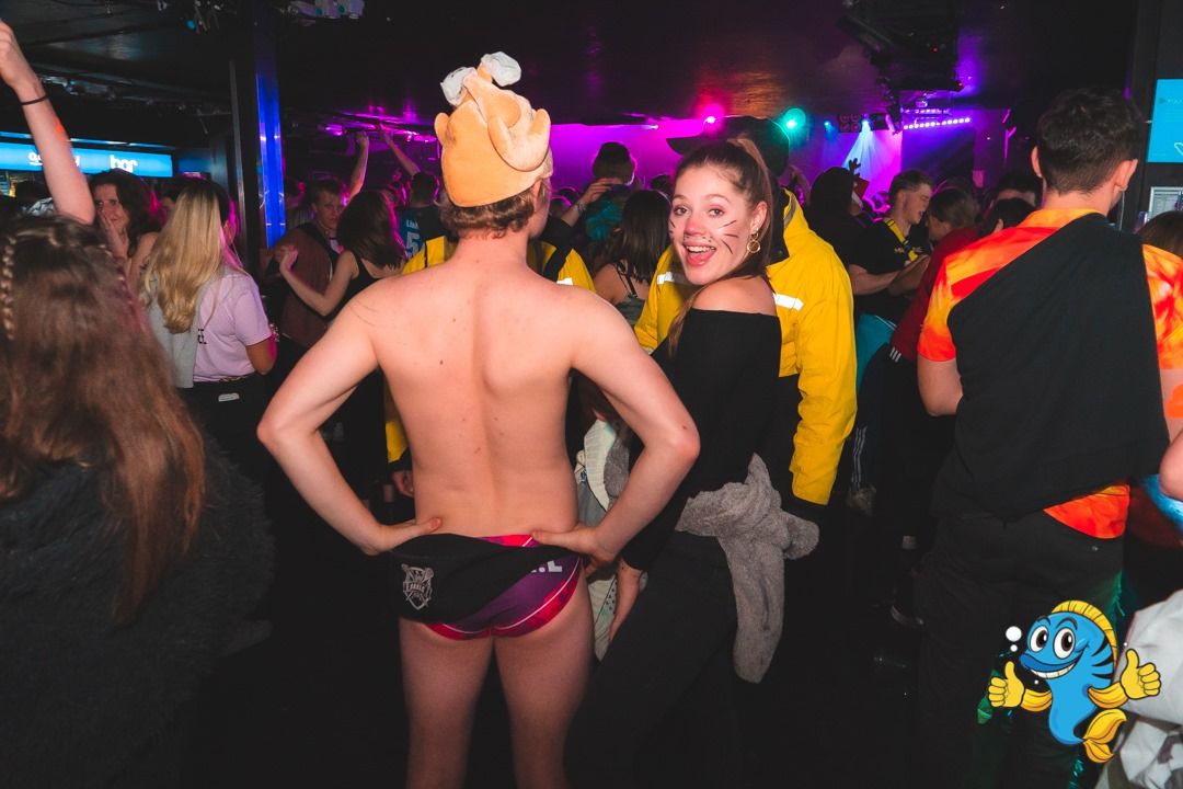 Image may contain: Clothing, Apparel, Disco, Party, Night Club, Club, Night Life, Human, Person