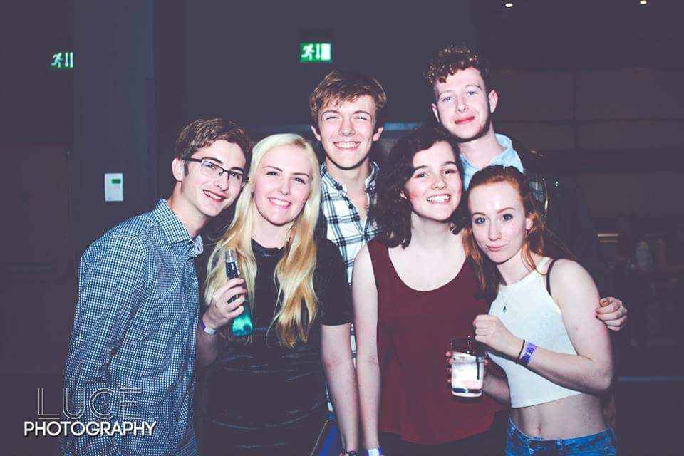 Don't have a drink to hold? Clutch onto your friends instead. (Credit to Luce Photography)
